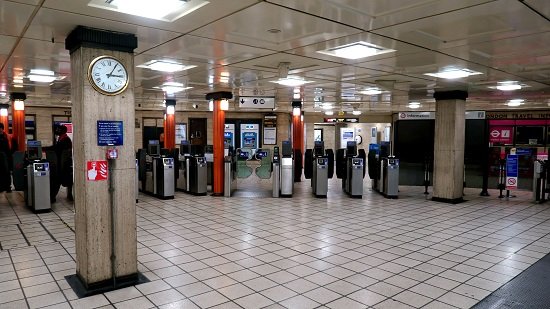 A picture of a nearly-empty Piccadilly Circus tube station in London during lockdown.